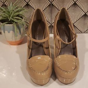 Platform penny loafer style pumps